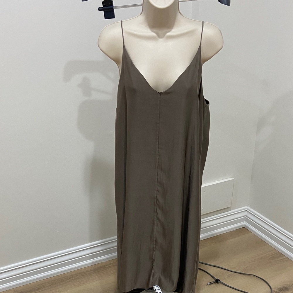 Silky spaghetti strap simple sheath dress in a taupe colour.